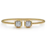 Exquisite 21K Yellow Gold Split Bangle Adorned with Baguette and Princess Diamonds