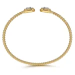 Exquisite 21K Yellow Gold Split Bangle Adorned with Baguette and Princess Diamonds - Image 4